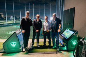 Golfers at ICAN TopGolf event
